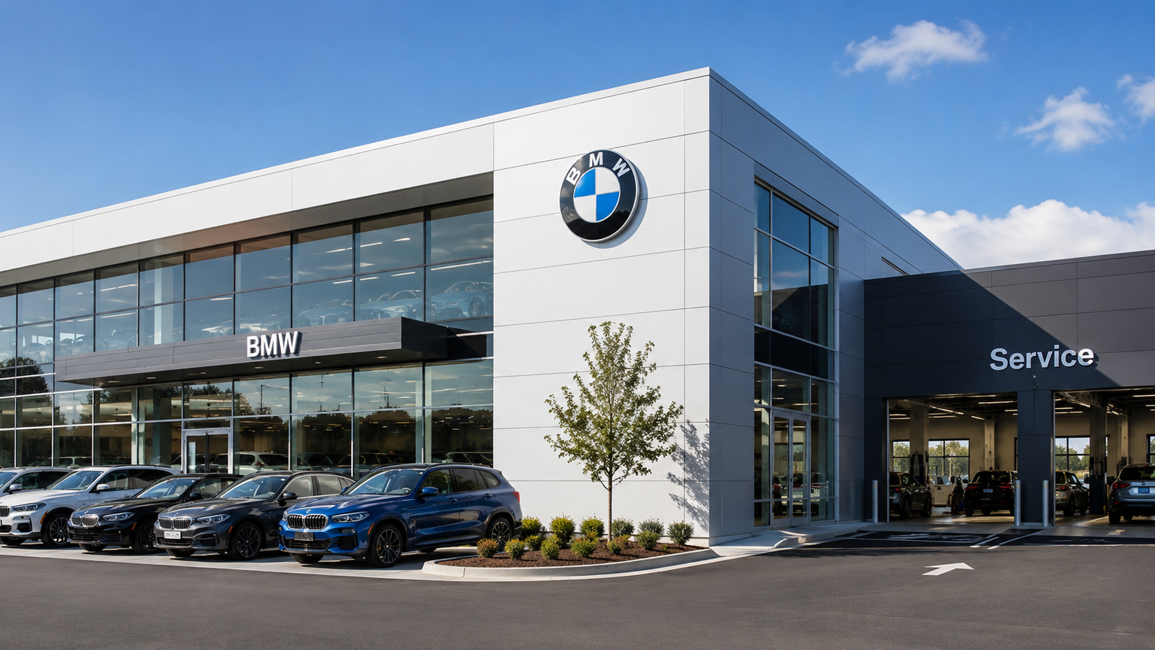 Modern BMW dealership exterior with showroom windows, BMW emblem, and a service entrance on the right.